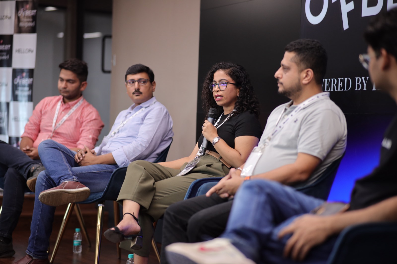 An Offbeat by HelloPM panel with a speaker answering into the mic