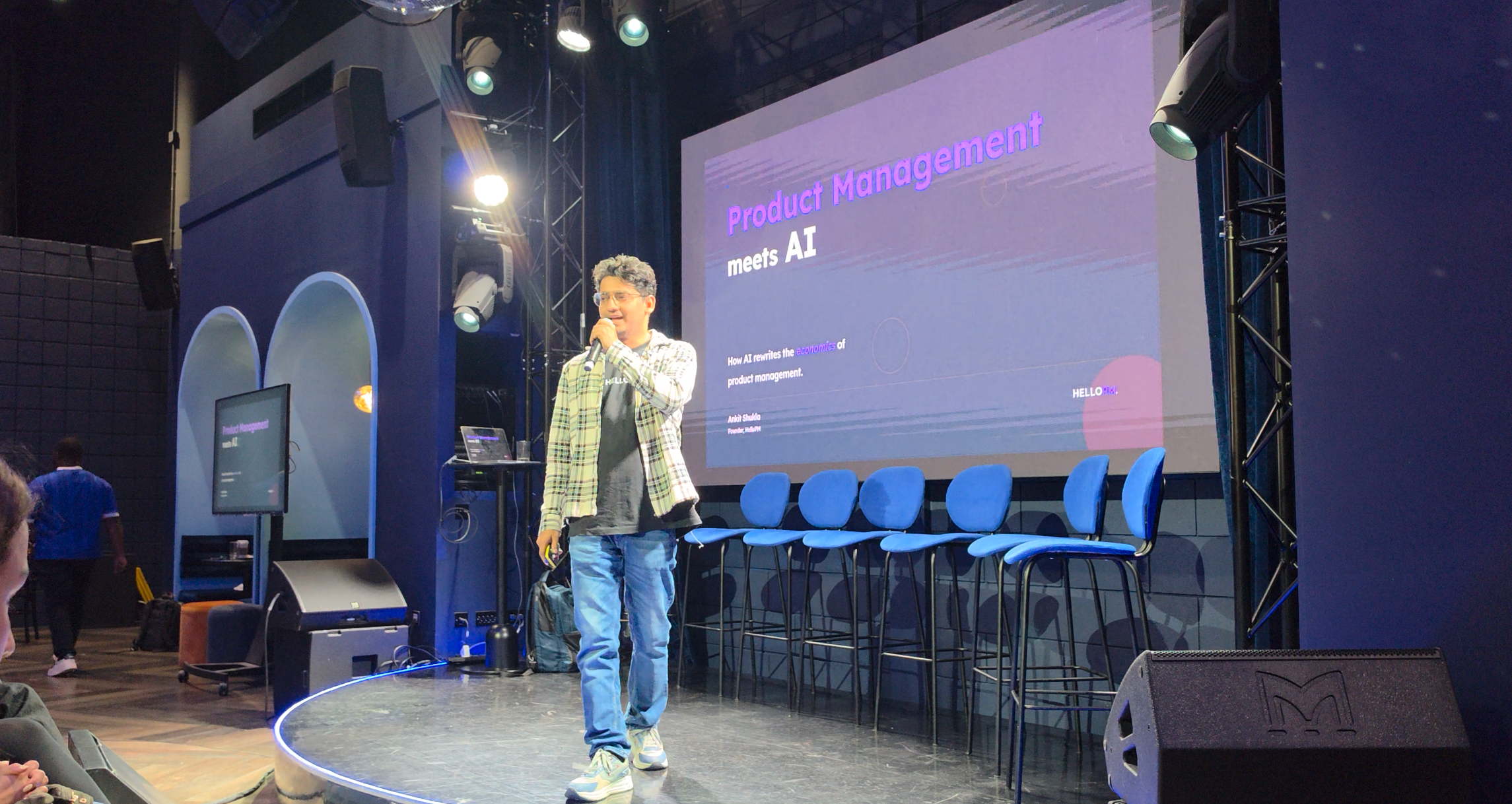 Ankit Shukla on stage presenting Product Management meets AI in London