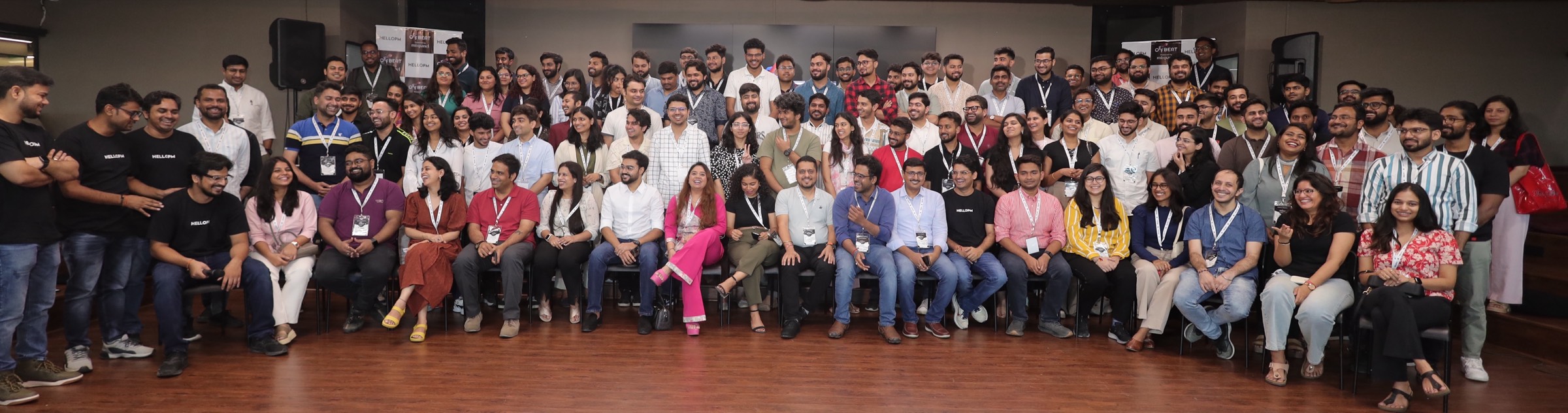 A large group photo of the full HelloPM Offbeat community gathered in one frame