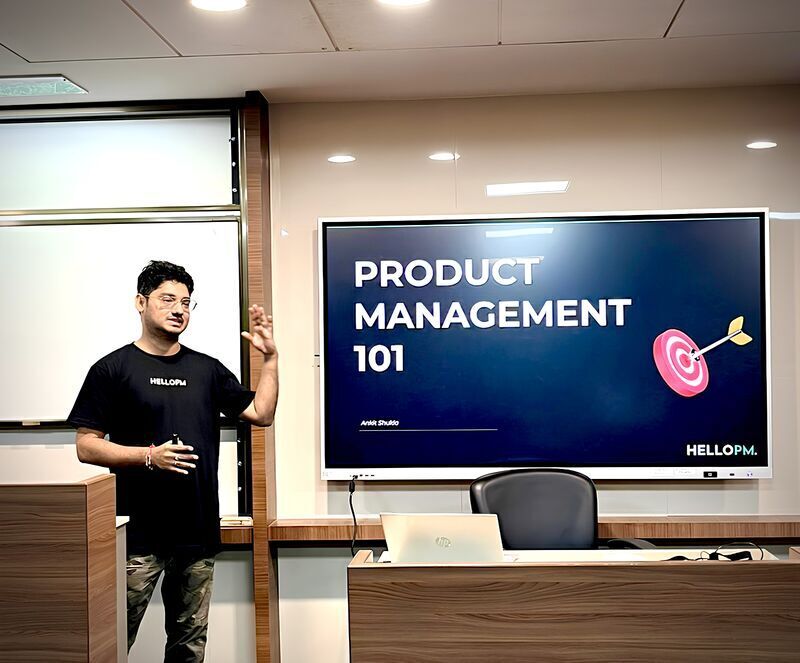 Ankit Shukla teaching Product Management 101 in front of a screen